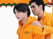 a man in a yellow jacket is putting his arm around another man 's neck