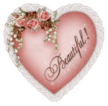 a pink heart with the words `` beautiful '' written on it surrounded by flowers .