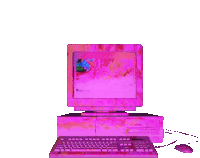 a pink computer with a keyboard and mouse on top of it