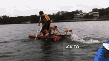 a man in a yellow vest is rowing a raft in the water with the words " ack to " above him