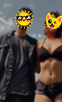 a man and a woman are standing next to each other with a sun and a cat behind them