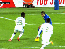 a soccer player with the number 29 on his back kicks the ball