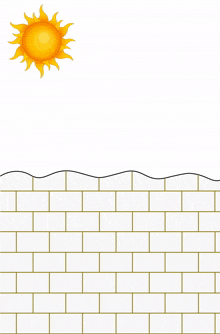 a white brick wall with a yellow sun in the sky