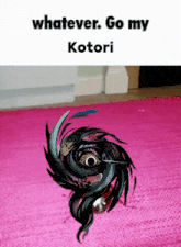 a picture of a spinning top that says whatever go my kotori on it