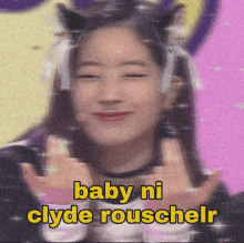 a picture of a girl with cat ears and the words baby ni clyde rousseler