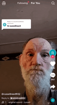 a man with a beard is on a live stream with a reply from russellreed932