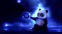 a panda bear is blowing a soap bubble in the dark .