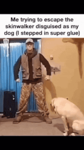 a man standing next to a dog that is looking at him