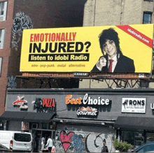 a billboard that says " emotionally injured listen to idobi radio "