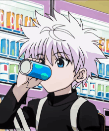 a boy with white hair is drinking from a can in front of a vending machine