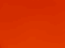 a close up of an orange background with a plain orange texture .