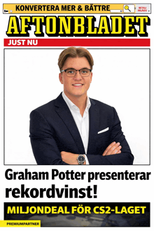 a man in a suit and glasses is featured on the cover of a newspaper