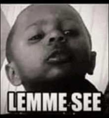 a black and white photo of a young boy with the words lemme see written on it .