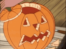 a cartoon of a person carving a pumpkin for halloween