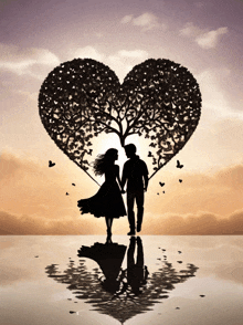 a man and a woman are standing under a heart shaped tree