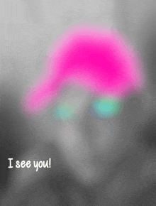 a blurry picture of a person with a pink hat and the words " i see you " on the bottom