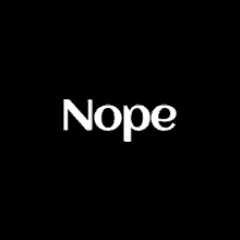 a black background with the word nope written in white letters .