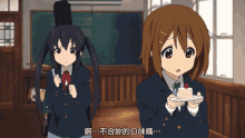 two anime girls are standing next to each other with one holding a piece of cake