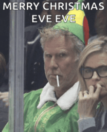 a man in a green elf costume smoking a cigarette with merry christmas eve eve written above him