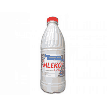 a bottle of mleko 3.2 % is sitting on a white background