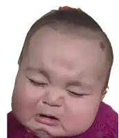 a baby is making a funny face with his eyes closed and his mouth open