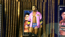 a wrestler in a pink jacket is standing in front of a poster that says " big b "