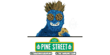 a sesame street character is wearing sunglasses and eating a cookie from pine street