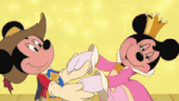 a mickey mouse and minnie mouse are dancing together