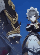 a girl in a maid outfit is standing next to a man