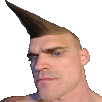 a shirtless man with a mohawk on his head looks at the camera