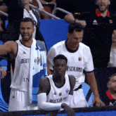 a basketball player wearing a jersey that says deutschland on it