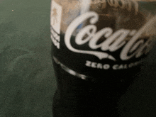 a close up of a bottle of coca-cola zero calorie