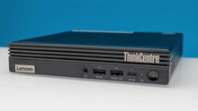 a lenovo thinkcentre computer sits on a white table