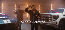 a man dancing in front of a gmc truck with the words si no quieres no below him