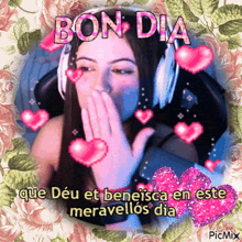 a picture of a woman with headphones blowing a kiss with the words bon dia above her