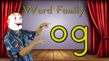 a clown is pointing at the word og in front of a stage