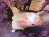 a cat is laying on a table with its eyes closed and hearts flying around it .
