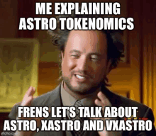 a man in a suit and tie is making a funny face while talking about astro tokens .