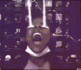 a blurry picture of a man 's face with a skull in the foreground