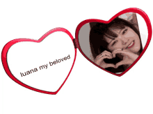 a heart shaped mirror with the words " luana my beloved "