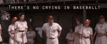 a group of baseball players are standing in a dugout with the words " there 's no crying in baseball " written above them