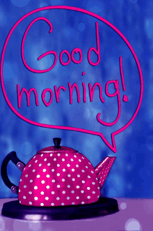 a pink polka dot teapot says good morning