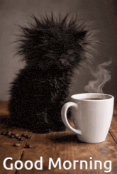 a black kitten sits next to a cup of coffee with the words good morning written on the bottom