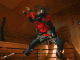 a blurry picture of a person wearing headphones and a red jacket with the letter a on it