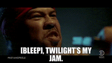 a man in a red hat is saying " bleep " twilight 's my jam "