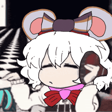a cartoon of a mouse with a bow on her head