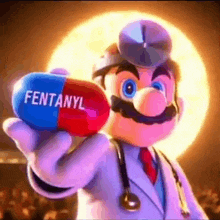 mario is a doctor holding a capsule of fentanyl in his hand .