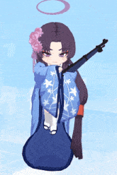 a girl in a blue kimono is holding a rifle