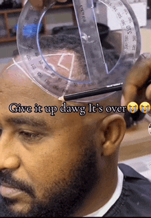 a man with a beard is getting his hair cut with a ruler and a pencil