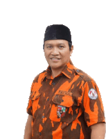 a man wearing a camouflage shirt with the name ricky prakasa on the front